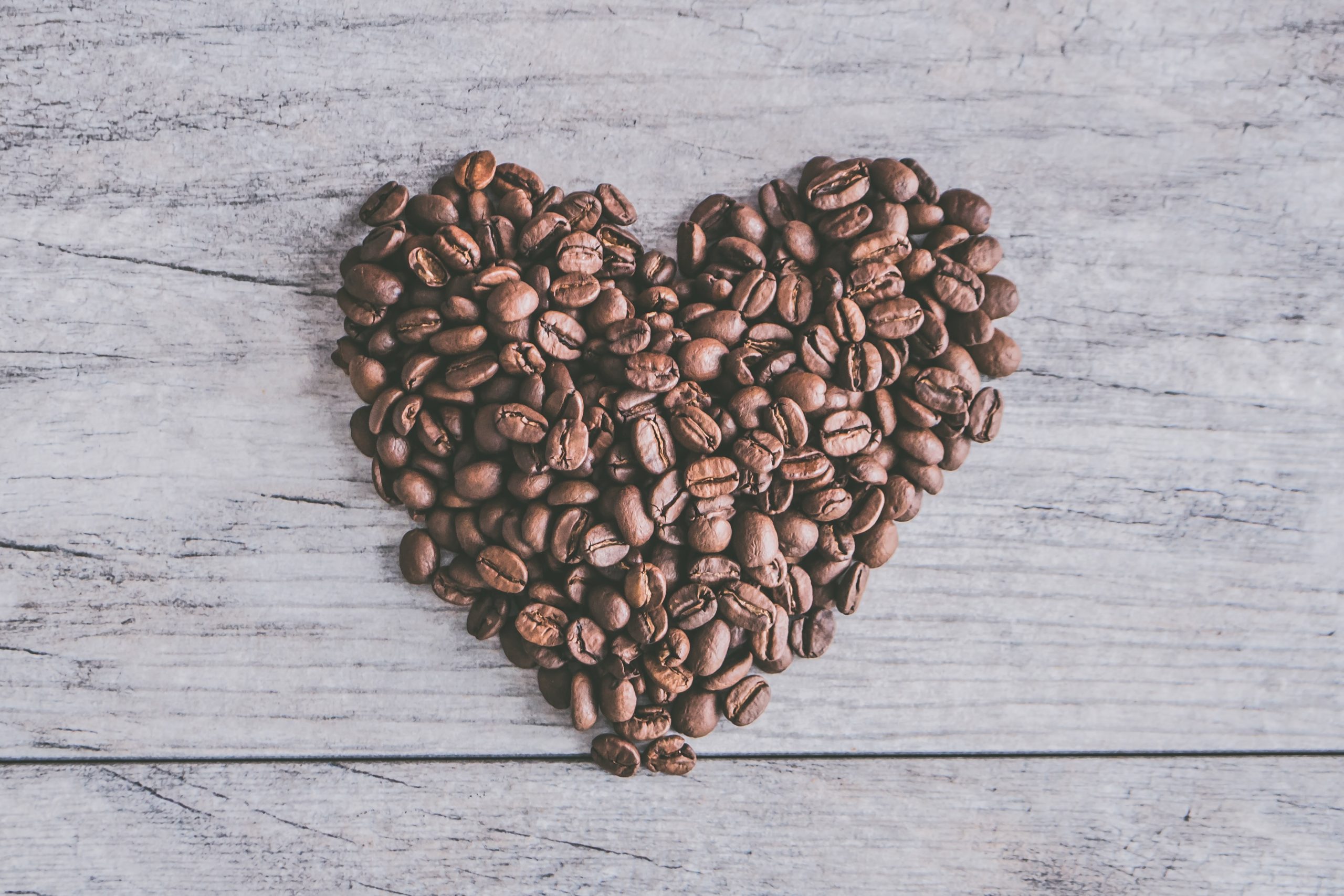 coffee beans arranged in a heart shape