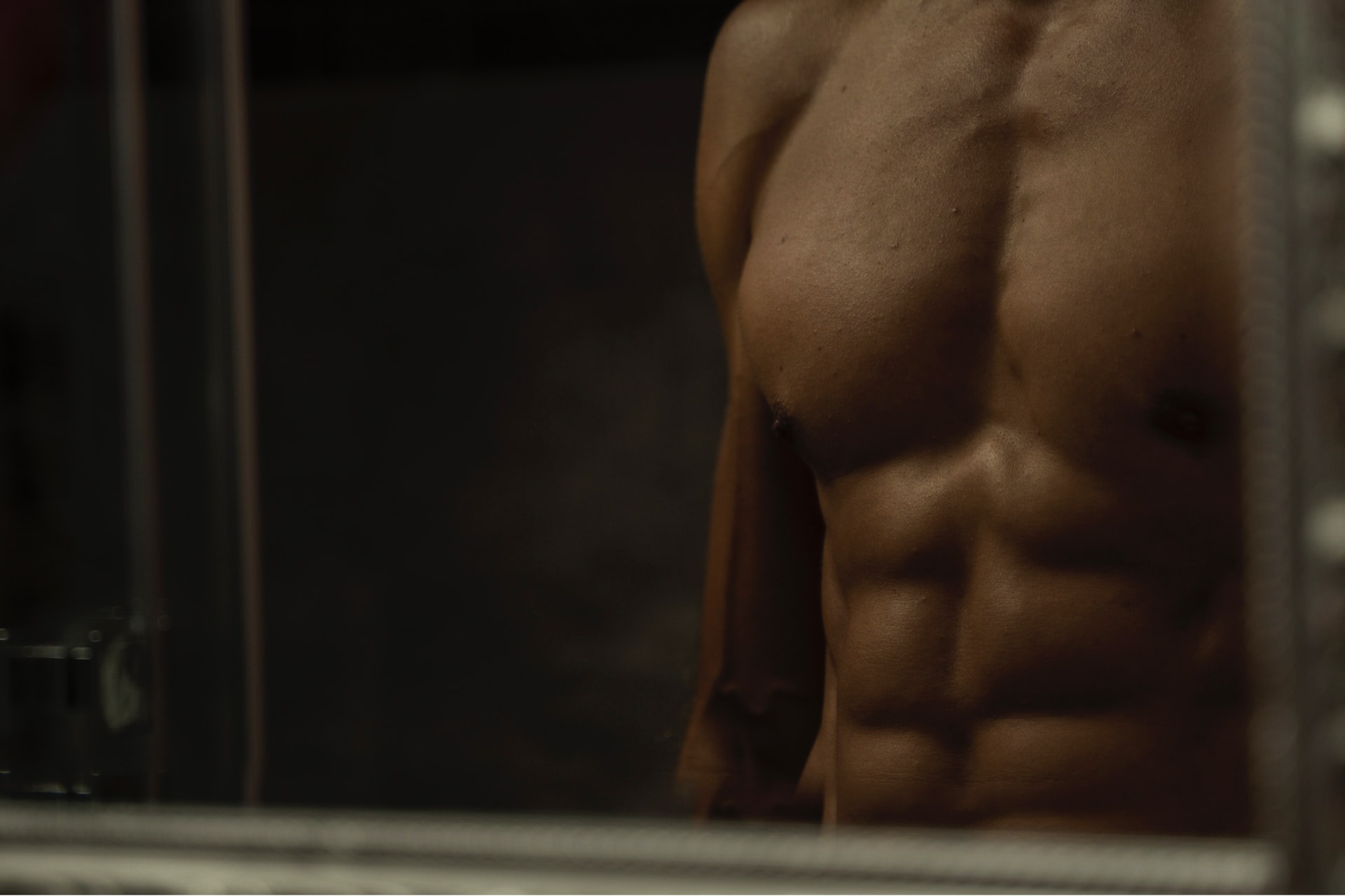 closeup of toned male body, how long does cool sculpting last