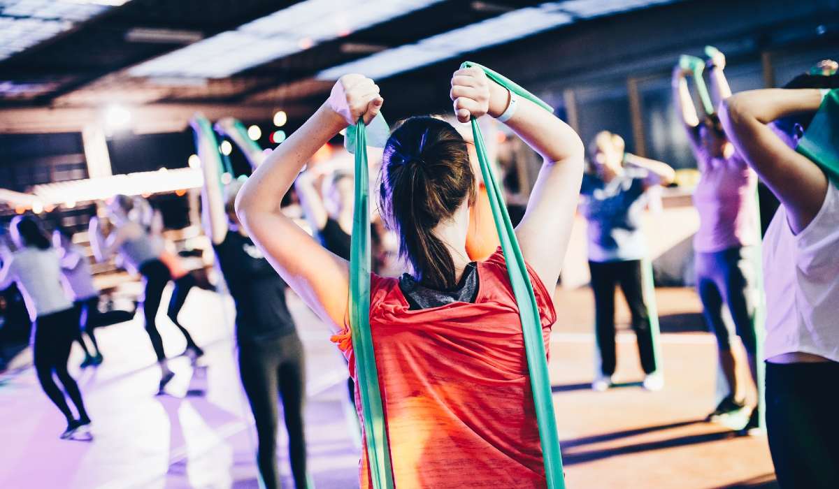 A group of people exercising in a gym